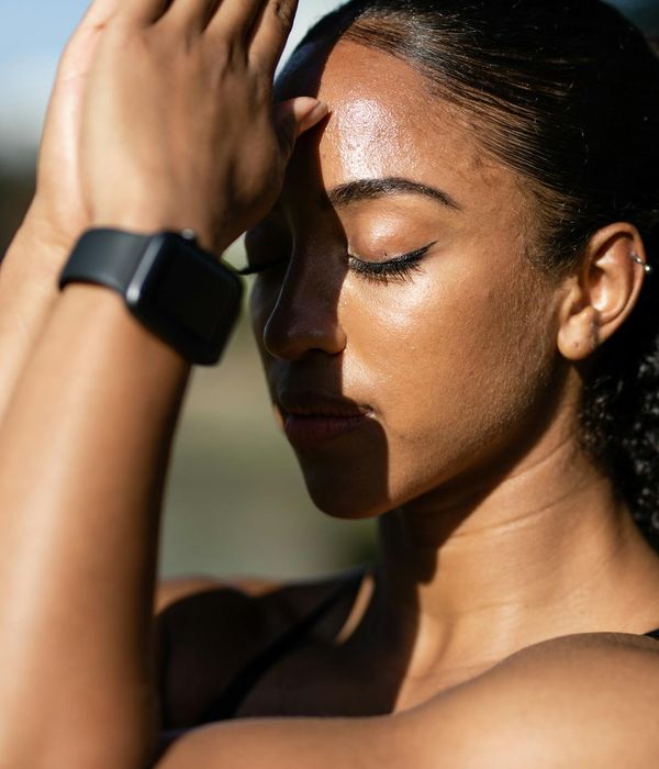 Person meditating peacefully, symbolizing inner wellness and calm.
